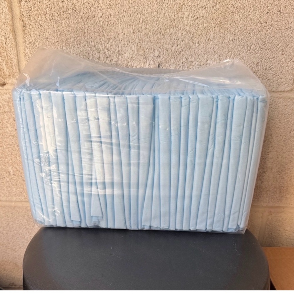 Pack of‎ Blue Disposable Pads 56 total